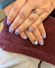 Negocio Enchanted Nails & Tanning Salon
