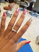 Top Nails Inc